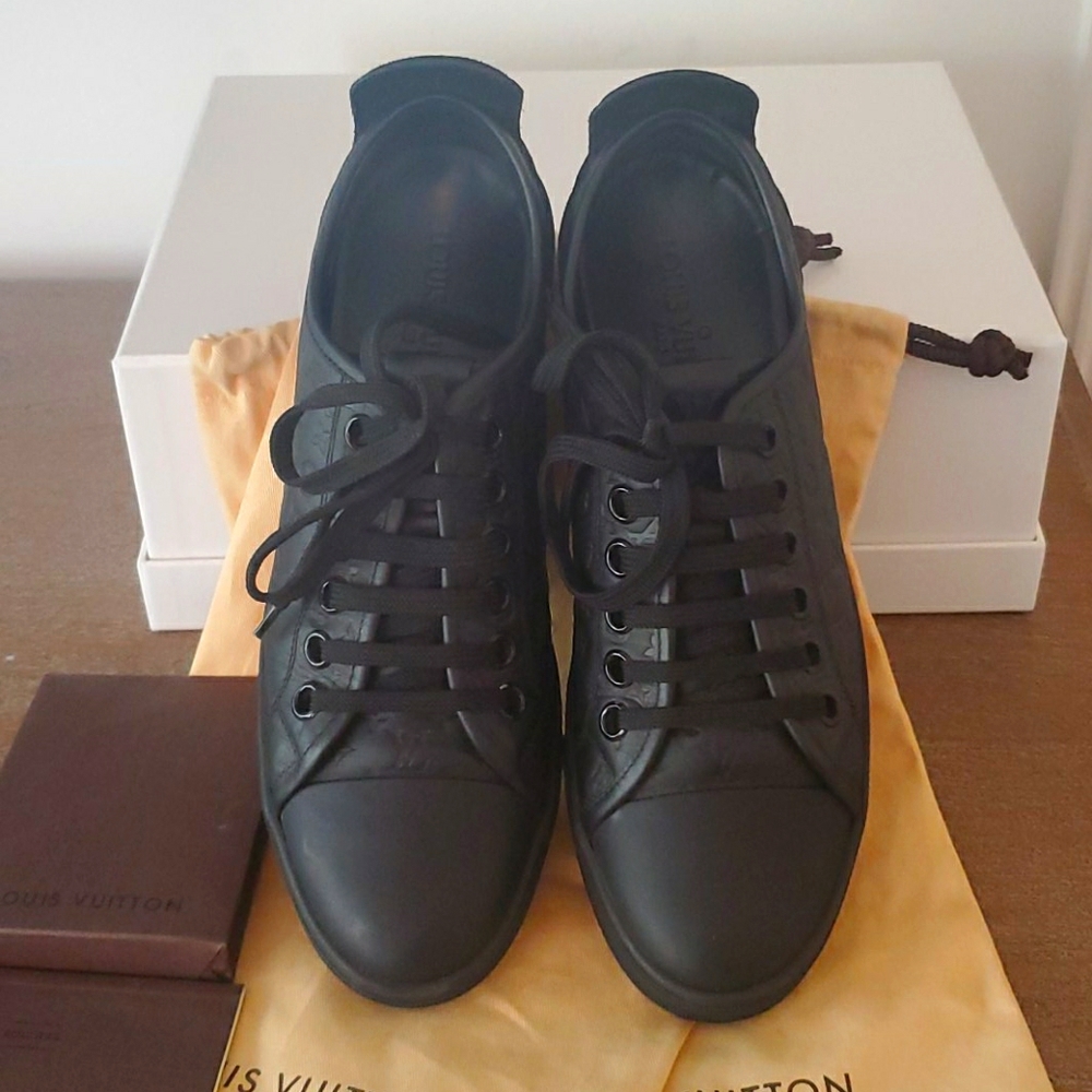 Authentic Louis Vuitton embossed leather sneakers.